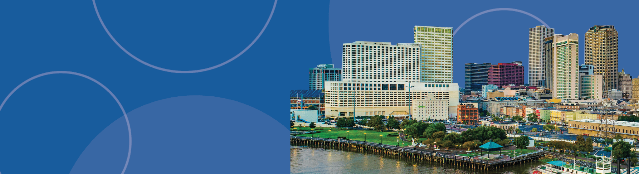 Scenic view of the Monroe, Louisiana skyline with the Ouachita River, representing workers' compensation services in the Monroe area.