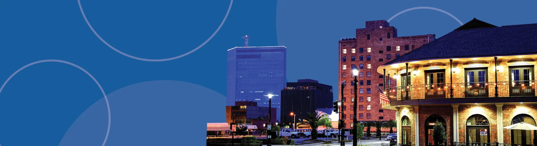 Nighttime view of downtown Lake Charles, Louisiana, featured on the Workers' Compensation Areas We Serve page